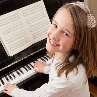 girl at piano