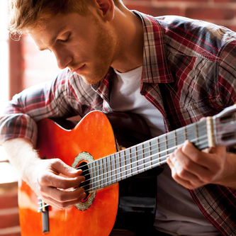 man playing guitar